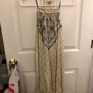 Cream patterned t-back dress